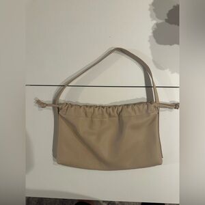Tan drawstring bag